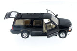 Black 2001 Chevrolet Suburban 1/27 Scale Diecast Model with Window Box by Welly