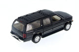 Black 2001 Chevrolet Suburban 1/27 Scale Diecast Model with Window Box by Welly