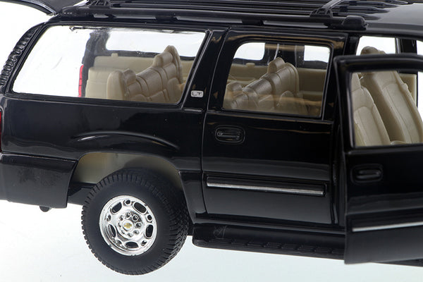 Black 2001 Chevrolet Suburban 1/27 Scale Diecast Model with Window Box by Welly