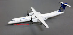 Herpa United Express Bombardier Q400 1/200 Scale Diecast Model with Stand Reg N328NG