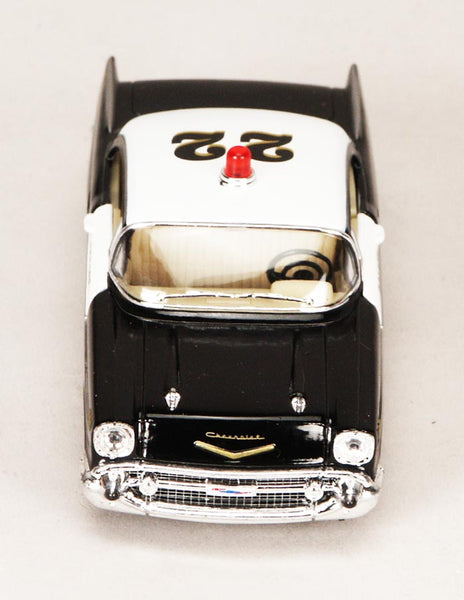 Diecast Black and White 1957 Chevrolet Bel Air Police Car Toy with Pullback Action