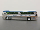 Greyhound 1/87 Scale 1964 MCI MC-5A Coach Bus Diecast Model (Greyhound Gold Stripe - 50th Anniversary)