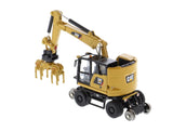 Diecast Masters 1/87 Cat® M323F Railroad Wheeled Excavator with 3 work tools and Collector's Tin