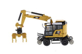 Diecast Masters 1/87 Cat® M323F Railroad Wheeled Excavator with 3 work tools and Collector's Tin