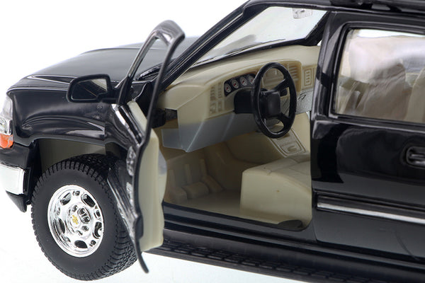 Black 2001 Chevrolet Suburban 1/27 Scale Diecast Model with Window Box by Welly